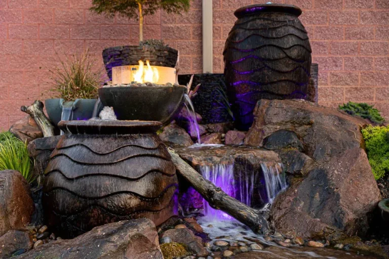 Paver walkway through a landscaped yard